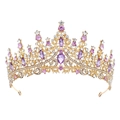 Close-up of royal crown showing purple and white crystals on golden alloy frame - Gold & Purple Crystal