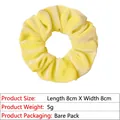 Detail of yellow velvet scrunchie showing 8cm diameter and soft elastic fabric texture - 8cm Metallic / Yellow