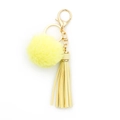 Fashionable key ring with a yellow fur ball and matching leather tassel on gold chain - Light Yellow