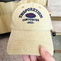 Detailed view of 3D embroidery on a beige cotton baseball cap with blue and red letters - 58-65cm / Off White
