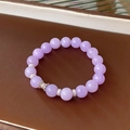Macro detail of purple fluorite beaded bracelet with silver crown charm and zircon spacers - 22# Purple Stone