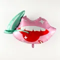 Pink foil balloon featuring a playful biting lips design for romantic party decorations - Cherry Lips Balloon
