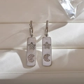 Silberne Edelstahl-Creolen in Rechteckform mit Zirkonia Stern und Mond Motiven für Damen - Silber