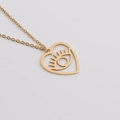 Collar de acero inoxidable dorado con colgante de corazón calado y diseño de ojo turco - Dorado