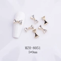 Détail des breloques nœud doré 5x9mm pour nail art avec strass K9 et mesure - Mini Nœud Doré (8051) / 5*9mm