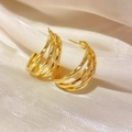Macro shot of gold layered hoop earrings on white silk fabric with mirror finish shine - 19# Gold Multi-layer Round Modern Style (19# Silver Earring Post-Gold-C Shape)