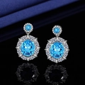 Elegant silver stud earrings with large round blue stone and white zircon halo detail - Luxury Aquamarine Zircon Earrings Tz-38