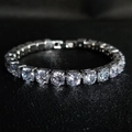 Classic silver-toned tennis bracelet featuring round-cut sparkling cubic zirconia stones - 6mm Platinum 17cm