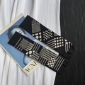 Japanese style black tabi socks with beige geometric patterns and two-toe split design - 35-41 / Black White Midnight