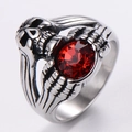 Punk skeleton ring in 304 stainless steel featuring a round red gemstone and skull motif - US 13 / Skull Head Holding Red Gemstone Style (Style A)