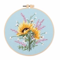DIY embroidery kit featuring sunflower and daisy patterns on light blue fabric - S841 Floral Bush(Blue)