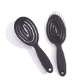 Professional black vented hair brush set with ergonomic spiral design and flexible bristles - Oval Case Black