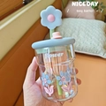 Close-up of glass tumbler with blue floral straw and cute flower pattern print - 500ml / Blue