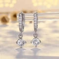 Elegant silver zircon hoop earrings with a hanging clear round brilliant-cut stone - One Pair / Silver