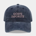 Close-up of pink 'GOD'S FAVORITE' embroidery on a washed navy cotton baseball cap - Adjustable / GOD'S FAVORITE / Navy Blue