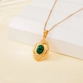 Golden necklace with a green malachite pendant in a vintage spiral setting - Malachite Swirl Base Style (137529)