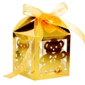 Dettaglio scatola regalo dorata con orsetto tagliato a laser e nastro arancione - Oro Riflettente