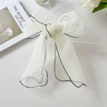 White organza bow hair tie with black contrast stitching and long elegant streamers - Off White