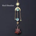 Golden suncatcher with mahogany obsidian star pendant and celestial metal elements - Red Obsidian Five-pointed Star Wind Chime
