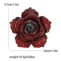 Spilla vintage a rosa con strass rossi, cornice in lega nera e dettagli dimensionali - Rosso