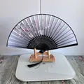 Oriental folding fan with pink cherry blossom pattern and elegant black silk tassel - Butterfly Loving Pink Flower (Grey)