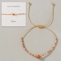 November Citrine Armband mit orangen Glasperlen und goldener Kordel für Damen - November Geschenkbox/Orange/Citrin