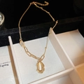 Detail of gold necklace with oval tiger eye pendant inside a luxury jewelry gift box - Opal Oval Style (16#) / Gold