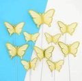 Set of 10 yellow butterfly cake toppers with brown outlines and white support sticks - Yellow Gold-Edged Butterfly Material Kit
