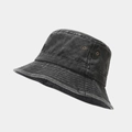 Detail view of washed denim bucket hat featuring vintage brass ventilation eyelets - M (56-58cm) / Black