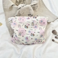 Quilted cotton makeup bag with pink dots and cartoon dog patterns for travel - Puppy Paradise