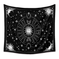 Close-up of black and white mandala tapestry featuring sun, moon, and star patterns - Galaxy Astrology Sun Moon