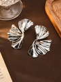 Macro detail of silver abstract floral earrings with textured metallic petals finish - S4234 Style