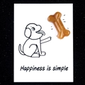 Orange dog bone shaped healing crystal stone on a simple happiness greeting card - Topaz