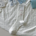 White ballet-style mid-tube socks featuring pink ribbon bows and transparent star charms - One Size / Button White