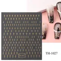 Self-adhesive nail sticker featuring gold starburst designs for chic nail art styling - TH-1027 (Gold Cross Star)