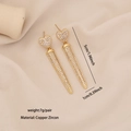 Elegantes pendientes de corazón y cono dorados con piedras de circón en tela beige - Estilo Cono Puntiagudo de Corazón Liso (2#)