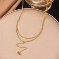 Double-layered 18K gold plated titanium necklace featuring a polished gold ball pendant - Double Layer Small Ball Style (H1309) / Gold