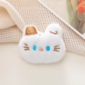 Close-up of a plush white cartoon animal brooch with blue eyes and embroidery detail - Original (Open Back) / White Cat Shape