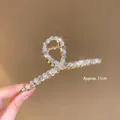 Premium 11cm gold-tone hair claw clip decorated with sparkling pearls and crystals - Cross Pearl Rhinestone