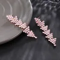 Elegant rose gold alloy drop earrings with sparkling pink and purple cubic zirconia - Pink Purple Serrated Drop / Rose Gold