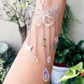 Detail of butterfly suncatcher with crystal prisms and silver metal moon and star charms - Silver Butterfly Moon Star