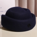 Detailed texture of navy wool felt hat featuring a round brim and metallic letter M badge - M(56-58CM) Adjustable / M-Letter Flight Attendant Hat / Dark Blue