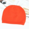 Vibrant orange knit beanie hat featuring a snug ribbed cuff for winter warmth - Orange Red