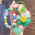 Colorful beaded keychain with rainbow cloud, green sequin flower, and heart charm - Sunflower Beaded Chain Keychain-Gradient Green
