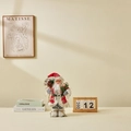 Poupée Père Noël classique avec un pull en tricot rouge et un sac rempli de cadeaux - 30cm