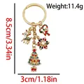 Christmas reindeer keychain with gold finish and painted charms, dimensions 8.5cm by 3cm - ER1776-Cane Tree Snowflake Deer Keychain