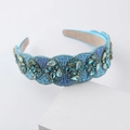 Detailed view of Baroque headband with blue beads and crystals on satin fabric - Blue