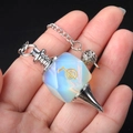 Opal stone pendulum with golden Cho Ku Rei Reiki symbol on a silver chain - Synthetic Opal
