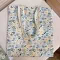Detailed flat lay of floral canvas tote bag featuring fresh blue and yellow petal prints - T-1 White Background with Blue Flowers
