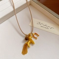 Golden horse pendant necklace with horseshoe, brown bead and silk tassel on cord - Gold Enamel Stone Horse Tassel Necklace